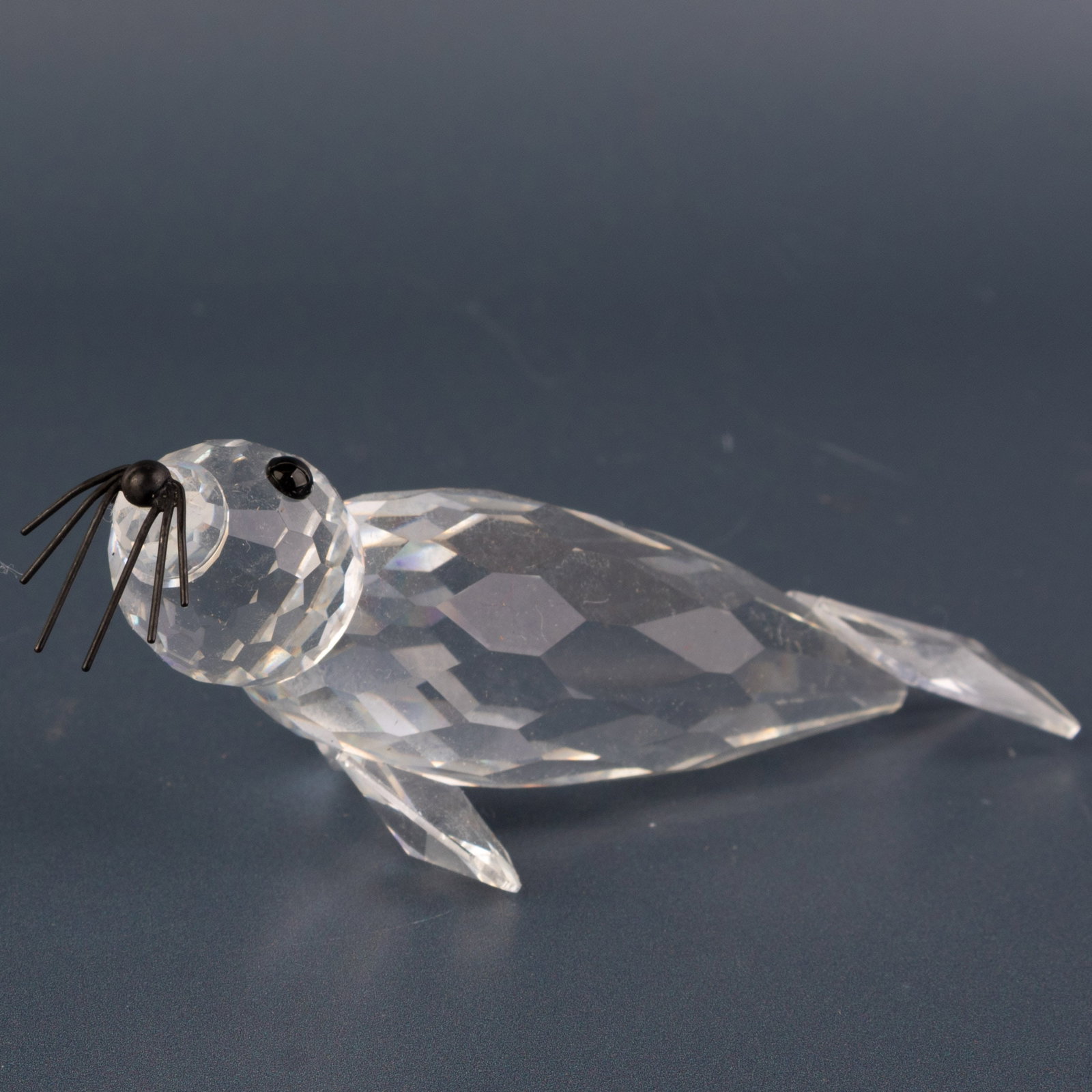 Swarovski Crystal Glass Seal With Whiskers Figurine: Height: 3.5 cm, Width: 9.5 cm. It is the responsibility of the Buyer to carefully examine each lot and form their own judgment regarding its condition, description, provenance, and authenticity prior 