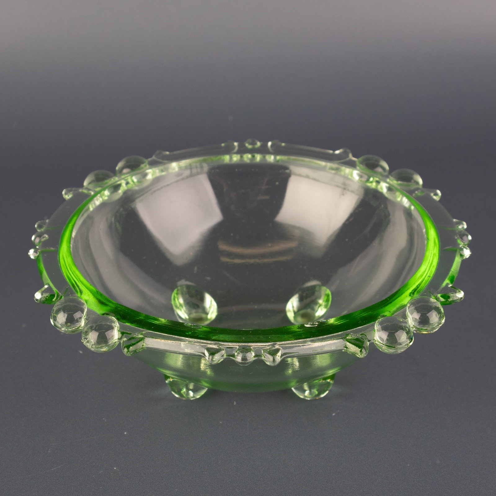 Art Deco 1930'S Uranium Glass Footed Bowl: (Height: 5.0 cm, Width: 12.5 cm) It is the responsibility of the Buyer to carefully examine each lot and form their own judgment regarding its condition, description, provenance, and authenticity prio