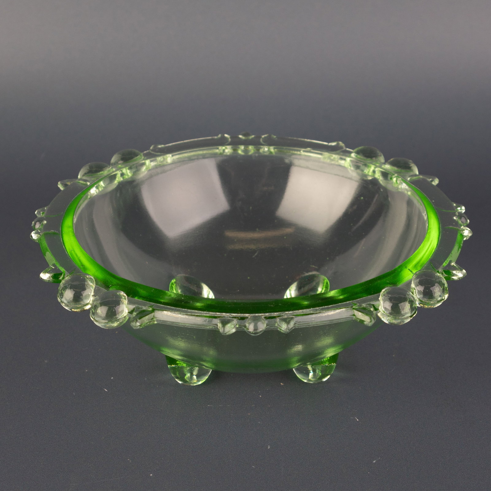 Art Deco 1930'S Uranium Glass Footed Bowl: (Height: 5.0 cm, Width: 12.5 cm) It is the responsibility of the Buyer to carefully examine each lot and form their own judgment regarding its condition, description, provenance, and authenticity prio