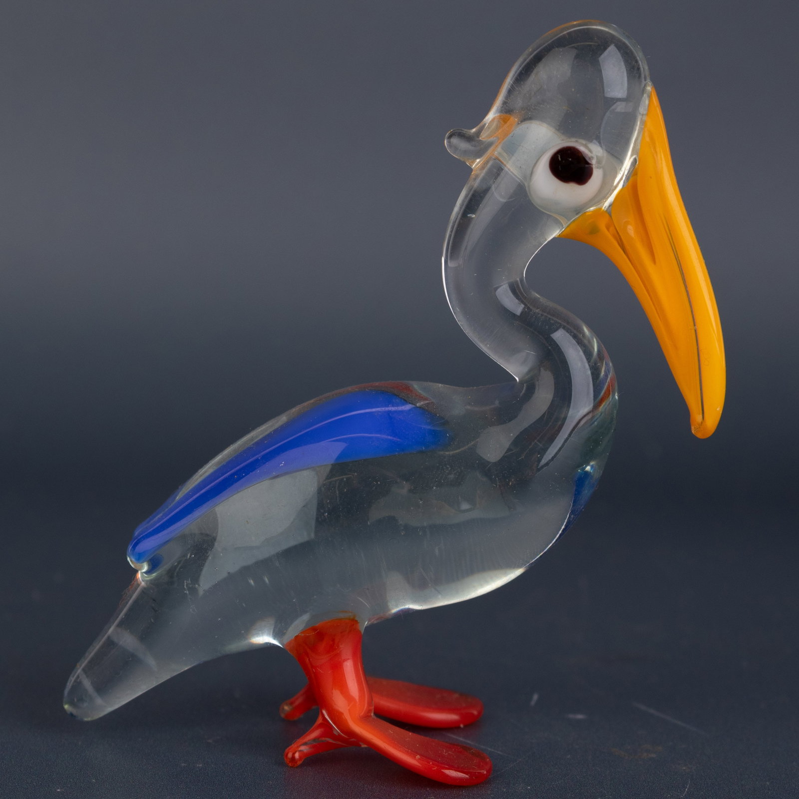 Mid Century Murano Hand Blown Glass Pelican Figurine: (Height: 7.0 cm, Width: 6.5 cm) It is the responsibility of the Buyer to carefully examine each lot and form their own judgment regarding its condition, description, provenance, and authenticity prior