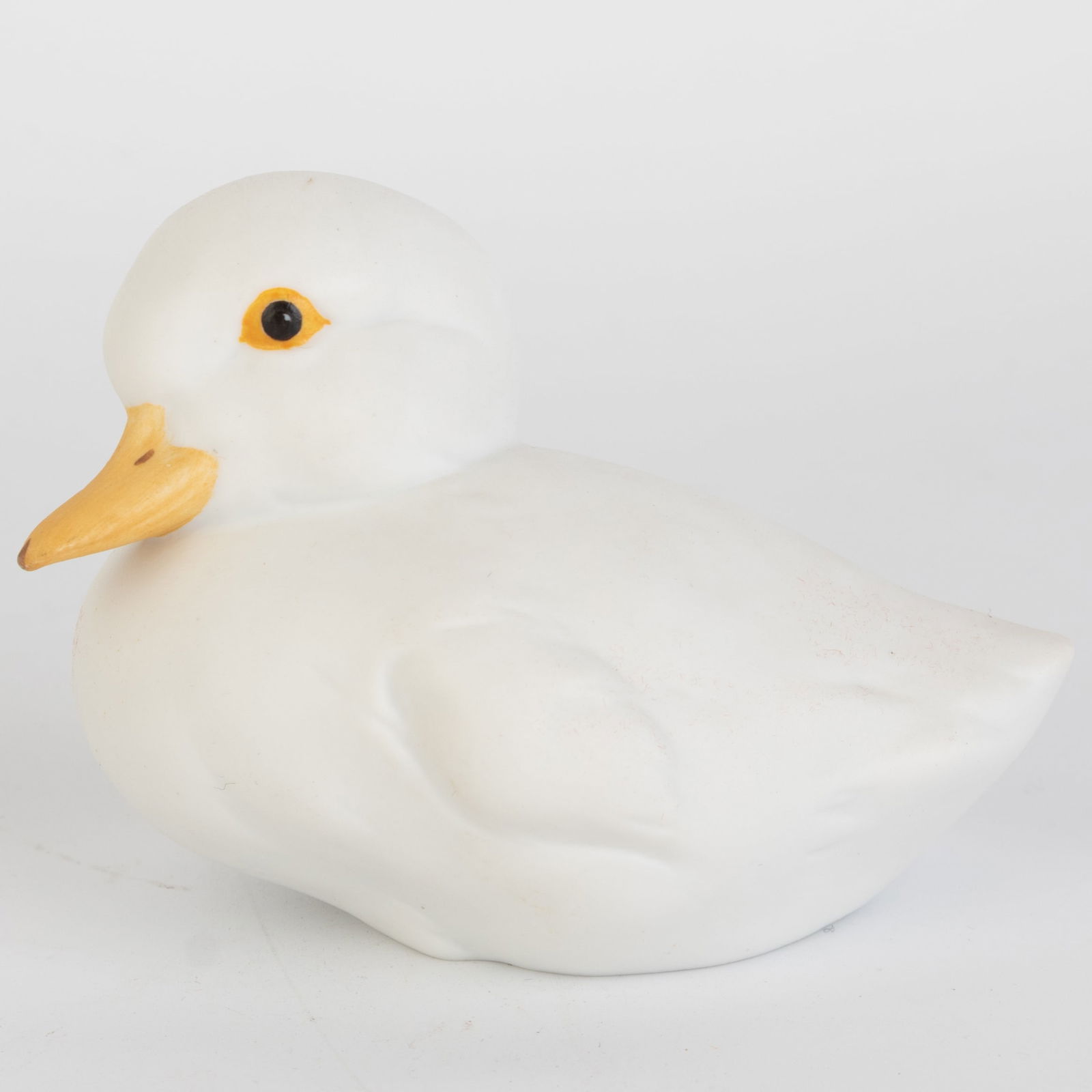 West German Kaiser Bisque Porcelain Duck Figurine: (Height: 5.5 cm, Width: 8.5 cm) It is the responsibility of the Buyer to carefully examine each lot and form their own judgment regarding its condition, description, provenance, and authenticity prior