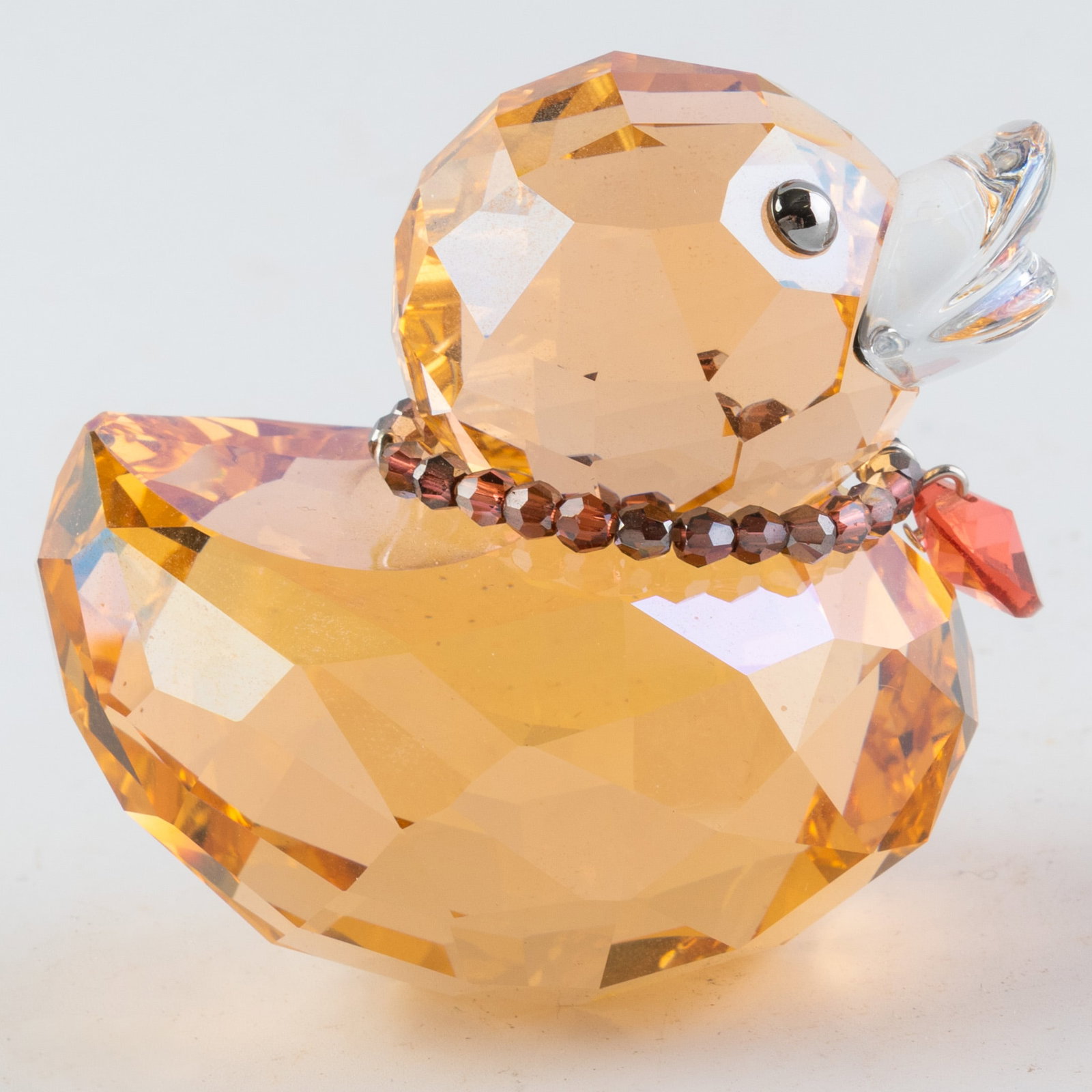 Swarovski Crystal Orange Happy Duck Figurine: It is the responsibility of the Buyer to carefully examine each lot and form their own judgment regarding its condition, description, provenance, and authenticity prior to making a purchase. We welcom