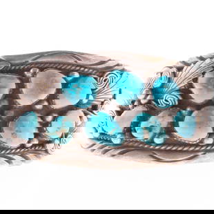 Vintage Navajo Sterling Silver Turquoise Cluster Cuff Bracelet: This vintage Navajo cuff bracelet features genuine turquoise stones in a striking cluster design. A wearable piece of Southwestern artisan heritage. It is the responsibility of the Buyer to carefully
