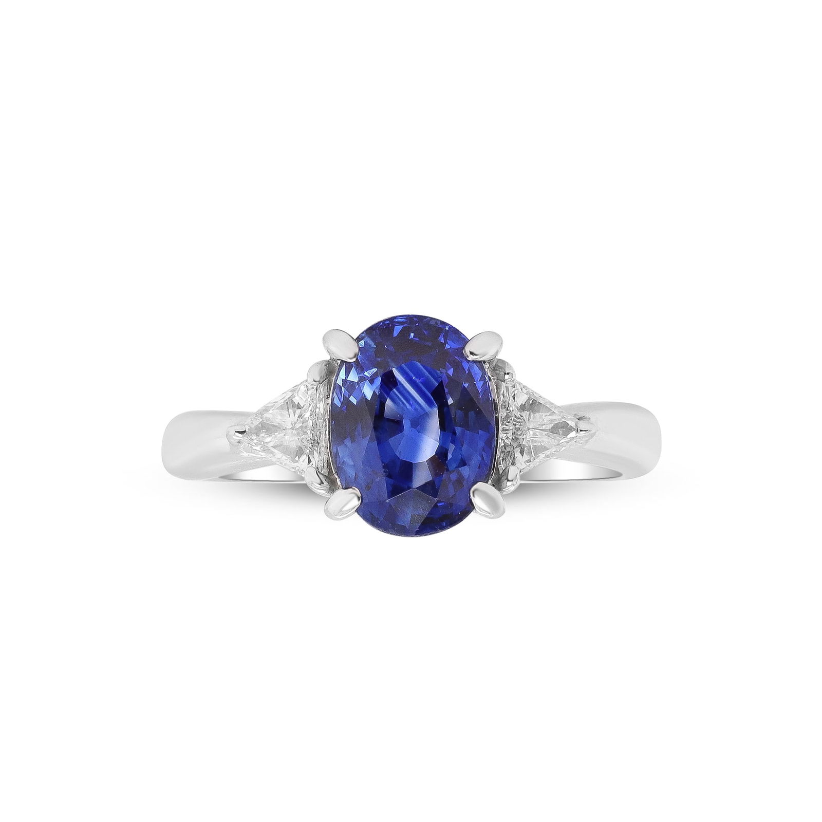 Midnight Promise, Platinum Blue Sapphire & Diamond Ring: Like a vow softly spoken under a canopy of stars, this magnificent ring articulates the essence of the heart?timeless, profound, and everlasting.At its heart radiates a captivating blue sapphire