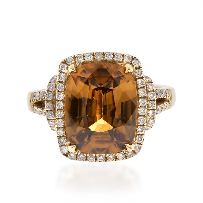Autumn Majesty: 14K Yellow Gold Brown Zircon & Diamond Ring: Rich, earthy elegance comes to life in this captivating 14K yellow gold ring. Crafted in luminous 14K yellow gold and weighing 6.01 grams, the setting offers a graceful yet substantial presence design