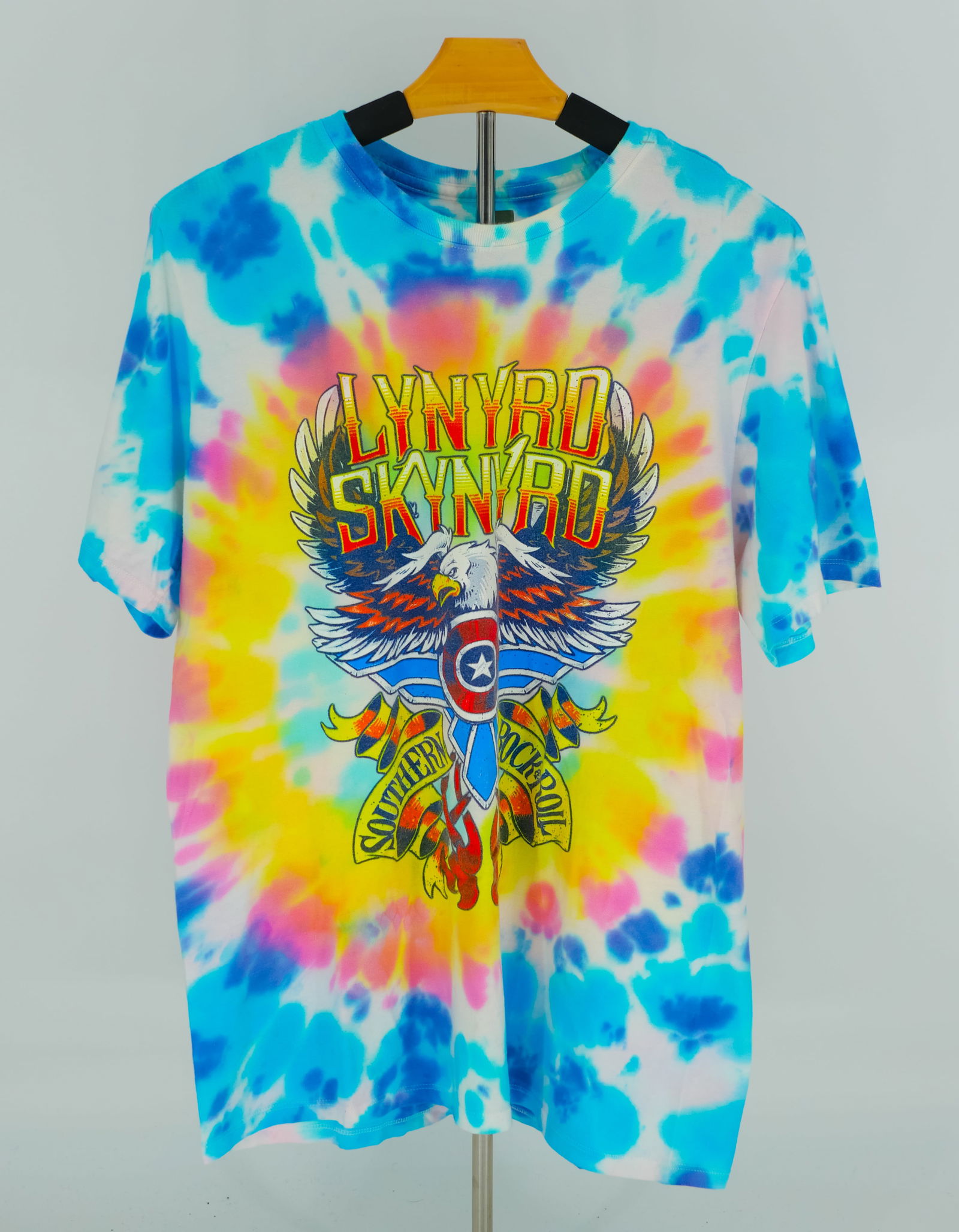 LYNYRD SKYNYRD Tie-Dye “Southern Rock & Roll" Eagle T-Shirt - Size L - Vintage Style Fire!: Turn up the volume with this bold tie-dye Lynyrd Skynyrd T-shirt, featuring a soaring eagle clutching a flaming guitar and the banner “Southern Rock & Roll”. With eye-popping blue, pink, and y