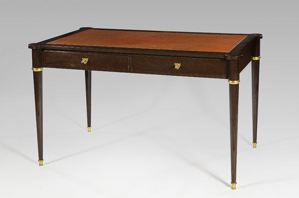 BATISTIN SPADE (1891-1969) Desk with rectangular: BATISTIN SPADE (1891-1969) Desk with rectangular top in brown lacquered wood standing on four slender feet and opening in the middle by two drawers. Ferrules and key-holes in gilded bronze. Top covere