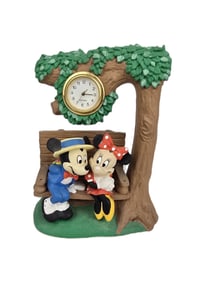 A Vintage Resin Dapper Mickey and Minnie Clock.