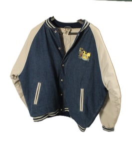 A Walt Disney World Commemorative Denim Jacket.