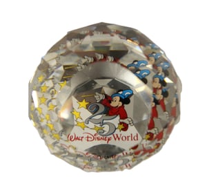 A Walt Disney World 25 Years Celebration faceted Swarovski Crystal Paperweight by Arribas.