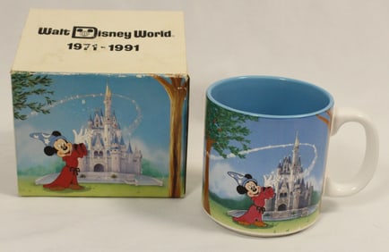 A Walt Disney World 20th Anniversary Coffee Mug.