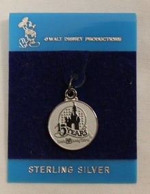 A Walt Disney World 15 Yr Anniversary Charm.