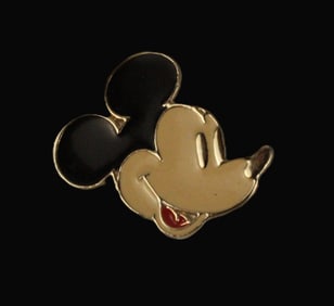 An Enamel Mickey Face Brooch.