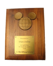 A Cast Member 10 Years of Service Plaque.