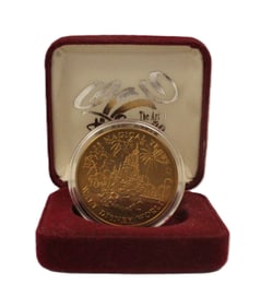 A Walt Disney World 25th Anniversary Coin.