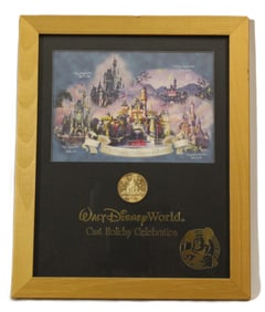A Walt Disney World Cast Framed Print and Coin.