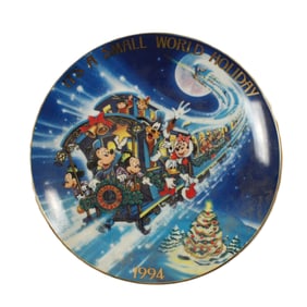 An "It's A Small World Holiday" Plate.