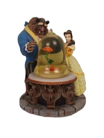 A Beauty And The Beast Enchanted Rose Snow Globe.