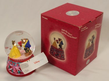 A Beauty and the Beast Snow Globe.