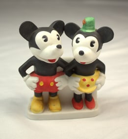 A rare reproduction of a 1930s Pie-eyed Mickey and Minnie Mouse Bisque toothbrush holder.