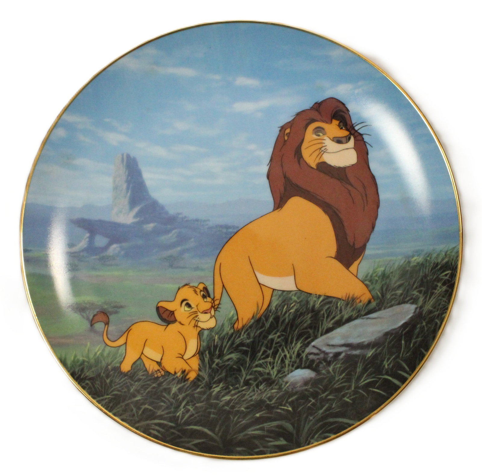 A Decorative Plate of The Lion King.: (Bradford Exchange, 1995) This is a limited edition (1095 A) masterpiece created by multiple artists it is titled "Like Father Like Son". This plate features an iconic scene from The Lion King. It is 