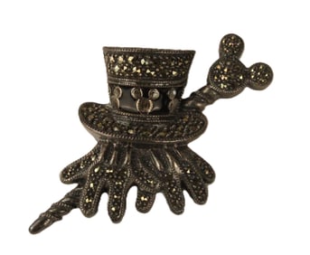 A Pewter Colored Top Hat, Gloves And Cane Pin.