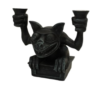 A Haunted Mansion Gargoyle Candle Holder.