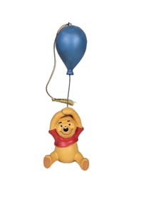 A WDCC Winnie The Pooh Ornament.