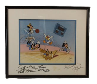 An Autographed Limited Edition Slam Dunk with the Fab Five Sericel.