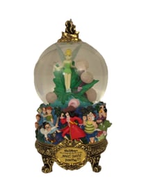 A Marc Davis Peter Pan Musical Snow Globe.