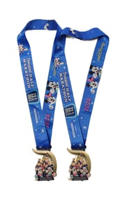 A Pair of 2024 Disneyland Half Marathon Medals.