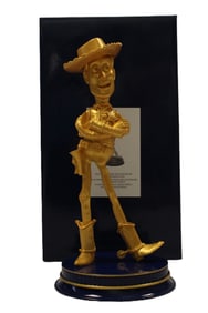A Walt Disney World 50th Anniversary Woody Golden Statue.