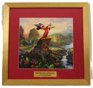 A Framed and Matted Thomas Kincaide Sorcerer's Apprentice Print.