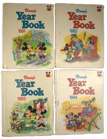 A Set of 4 Disney's Year Books.