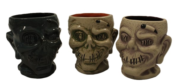 A Trio of Trader Sam's Enchanted Tiki Bar Zombie Mugs.