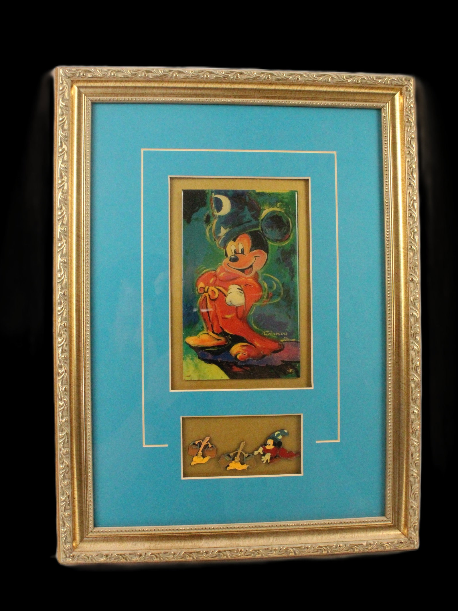 A Framed Sorcerer's Apprentice Pin Set. (1 of 4)