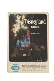A pair of Disneyland Guidebooks.