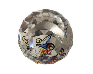 A 100 Years of Magic faceted Swarovski Crystal Paperweight by Arribas.