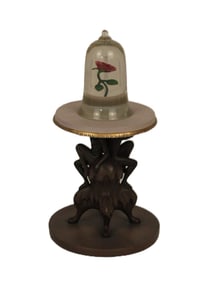 An Enchanted Rose Figurine.
