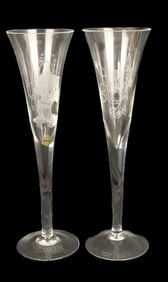 A Pair of Fantasia 2000 Champagne Flutes by Ingrid.