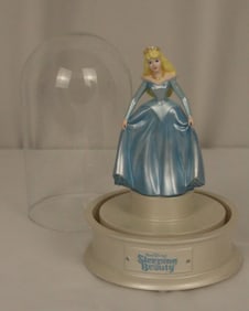 A Metal Aurora Figurine.