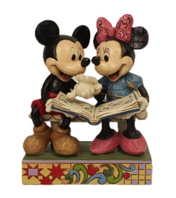 A Disney Traditions Mickey and Minnie Figurine.