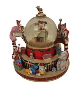 A Limited Edition ?Santa's Workshop? Disney Characters Snow Globe.