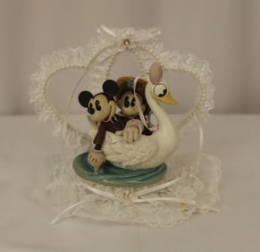 A Mickey and Minnie Mouse Wedding Cake Topper