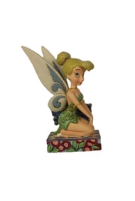 A Jim Shore Kneeling Tinker Bell Figurine.