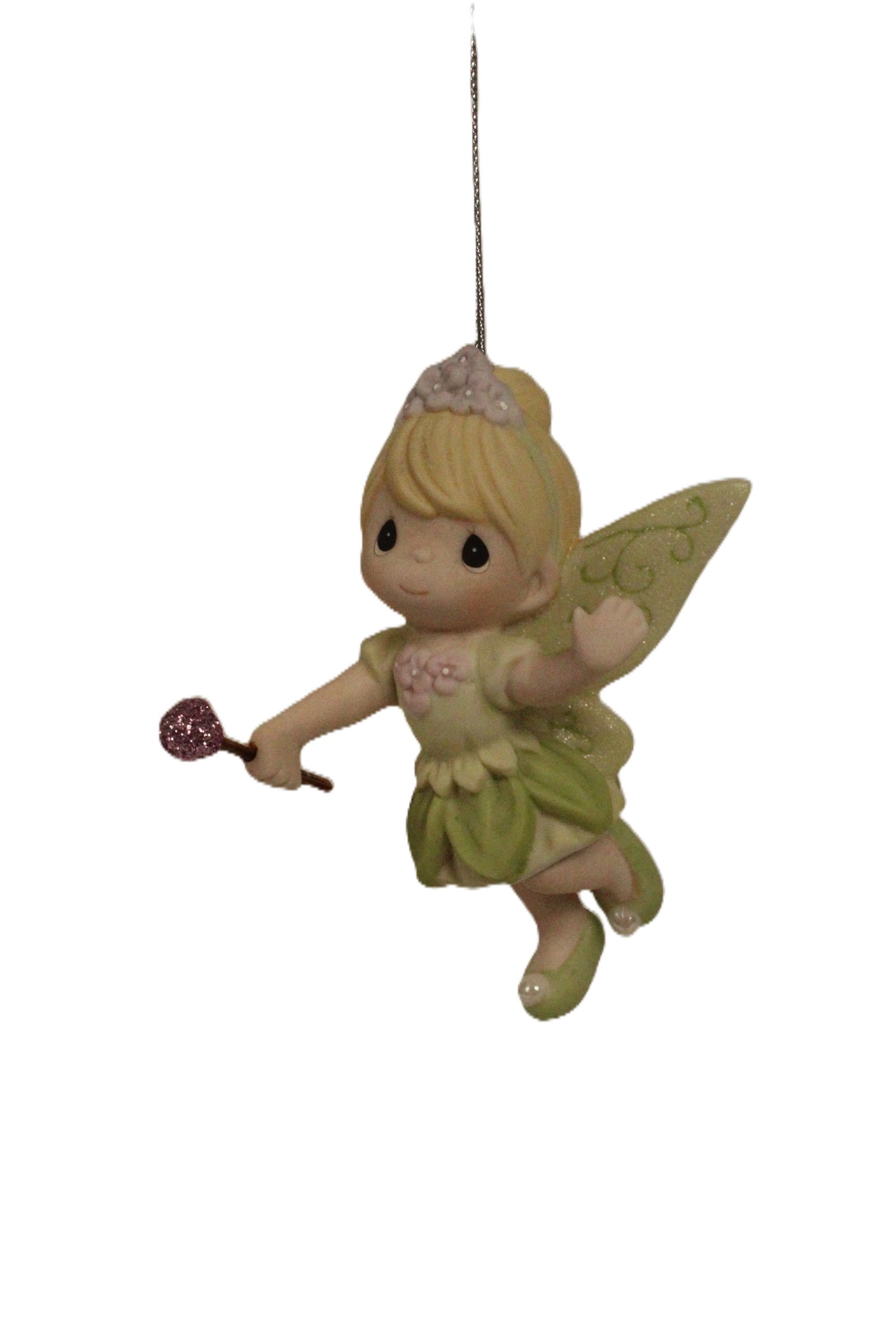 A Precious Moments Tinkerbell Ornament.: (Precious Moments) This is a hand-painted bisque porcelain ornament titled ?Faith, Trust and Pixie Dust.? It measures 4? tall and is in excellent condition.