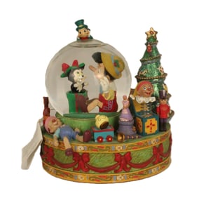 A Large Pinocchio Christmas Snow Globe.