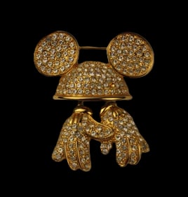 A Gold-Toned Mickey Ear Hat and Gloves Brooch.