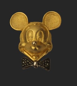 A Gold-toned 3-D Mickey Face with Swarovski Crystal Adorned Bow Tie.