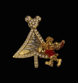 A Gold-toned Christmas Tree and Santa Mickey Swarovski Crystal Pin.